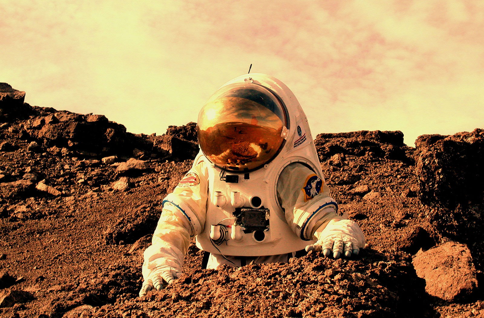 Artist's concept of astronaut working on Mars