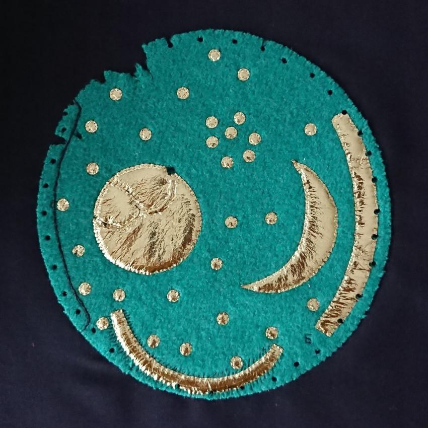 Nebra Sky Disk in its damaged condition after it was found and restored