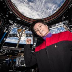 Italian ESA astronaut Samantha Cristoforetti in the Cupola on the International Space Station