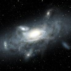 An artist's impression of a large blue-grey galaxy in space, surrounded very closely by 5 smaller satellite galaxies which appear grey in colour. Faint background stars are seen surrounding all of the galaxies.