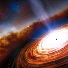 This artist's impression of a quasar shows a bright orange and white disc of material centred around a small black circle. A jet of light emanates from this circle, white and blue in colour.