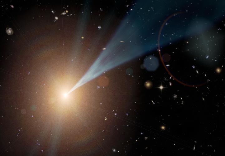 The artist's impression shows a source of bright yellow-white light against the dark backdrop of space. Coming from the centre of the light source is a conical jet that is blue in colour. Faint, smaller galaxies are seen in the background of the image,