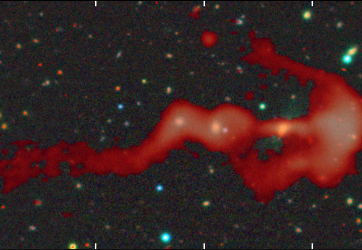 RAD-BAARG radio galaxy, with the 144 MHz radio image from the LOFAR radio telescope shown in red and the optical image from the BASS survey shown in RGB colour. 